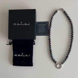 The Danbury Mint Black Pearl Necklace with Silver Circle Accent